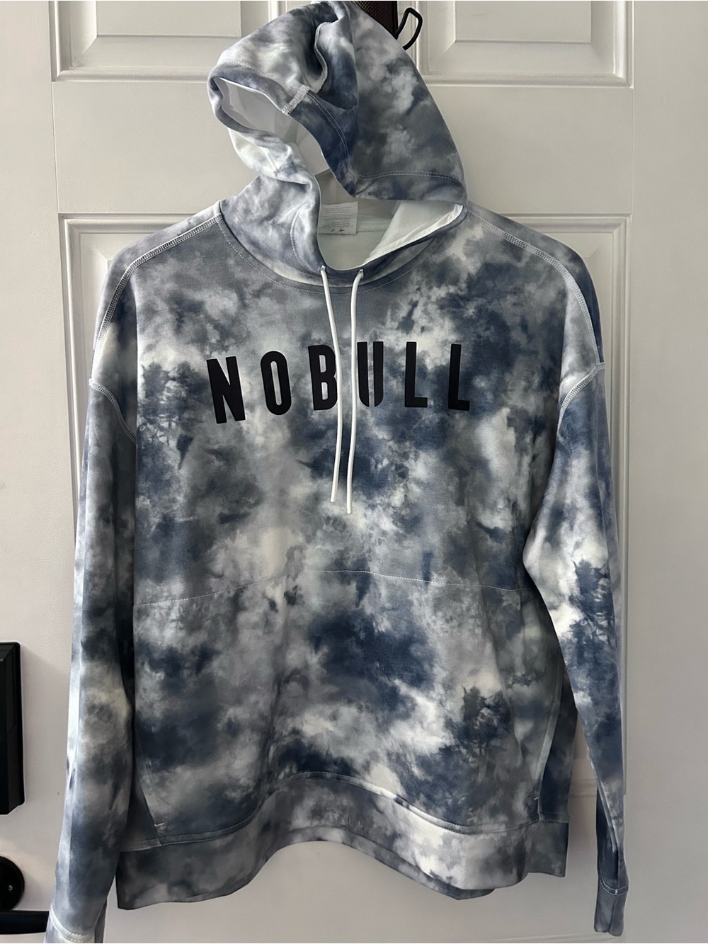 NOBULL Blue and White Tie-Dye Pullover Hoodie. Unisex